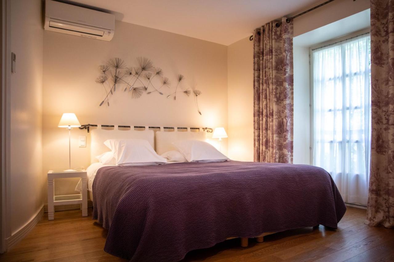 Le Vieux Pont Hotel Belcastel  ภายนอก รูปภาพ